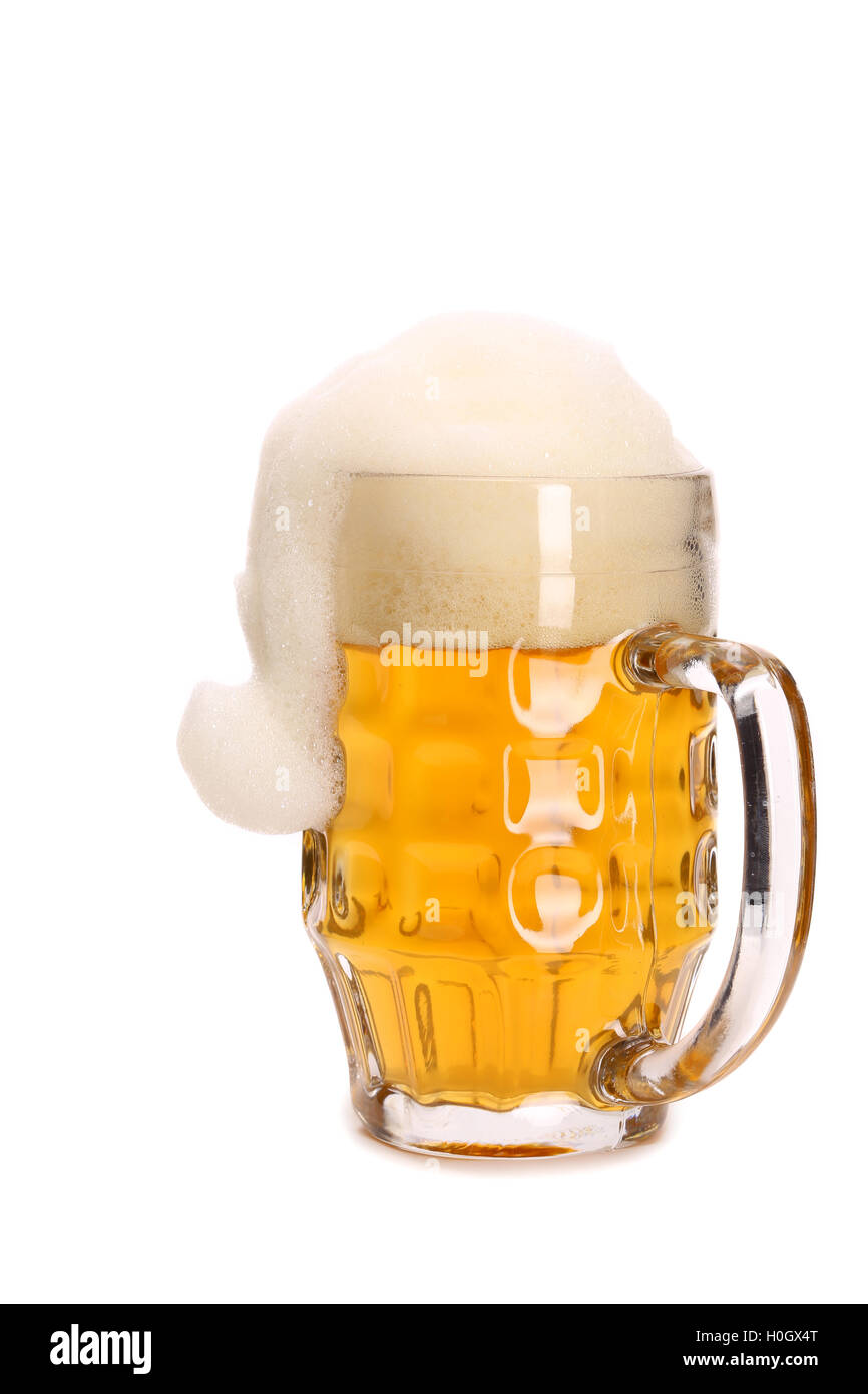 Boccale di birra merita e santa's hat. Foto Stock