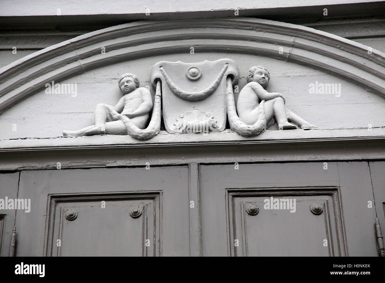 I dettagli delle sculture cherubino, Stiftsgarden palazzo nella città di Trondheim, Norvegia Foto Stock