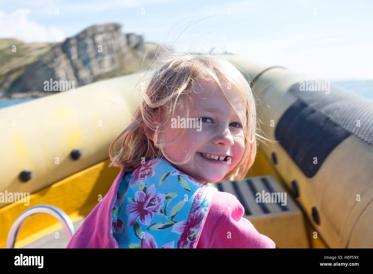 ragazza su una costola Foto Stock