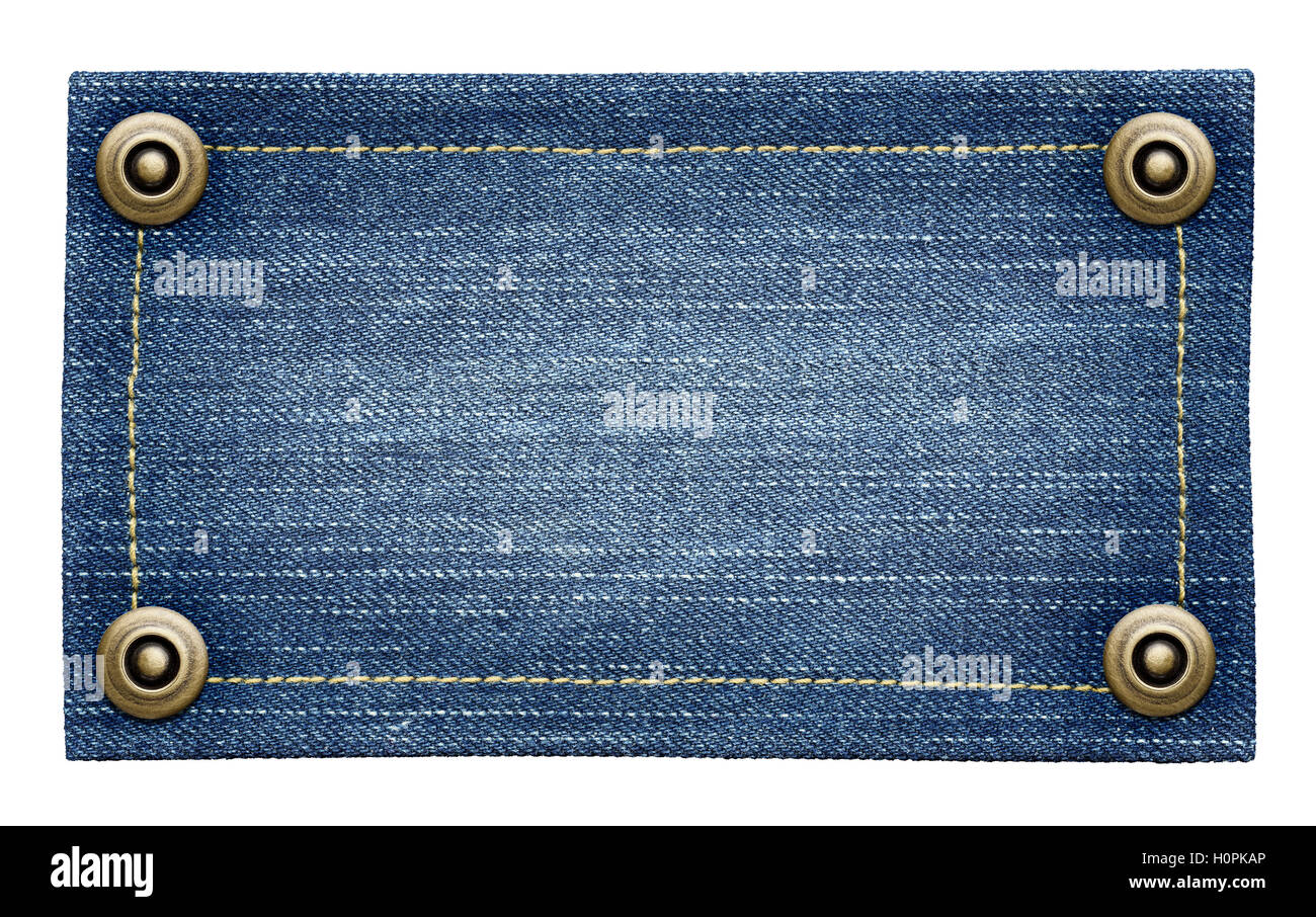 Indossare jeans blu tag texture. Isolato etichetta denim con rivetti. Foto Stock