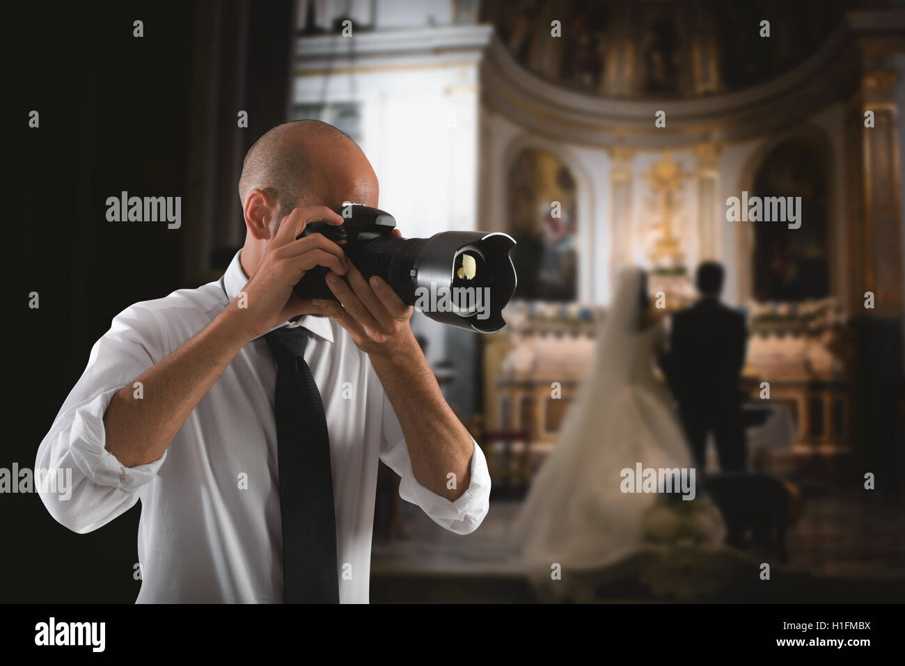 Fotografo professionista in un matrimonio Foto Stock