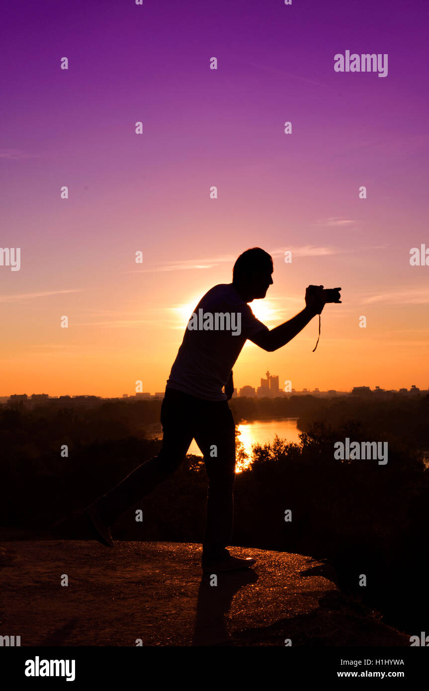 Fotografo in azione Foto Stock