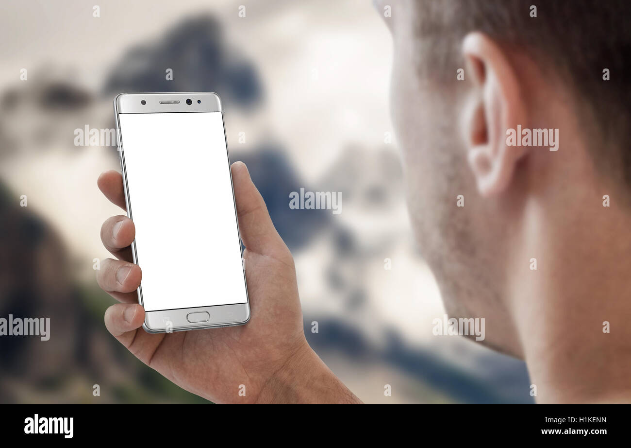 Smart phone in man mano. Bianco display isolato per app mockup. Foto Stock