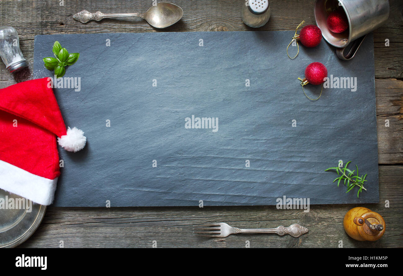 Abstract di Natale sfondo culinario sul vecchio retrò pietra nera Foto Stock