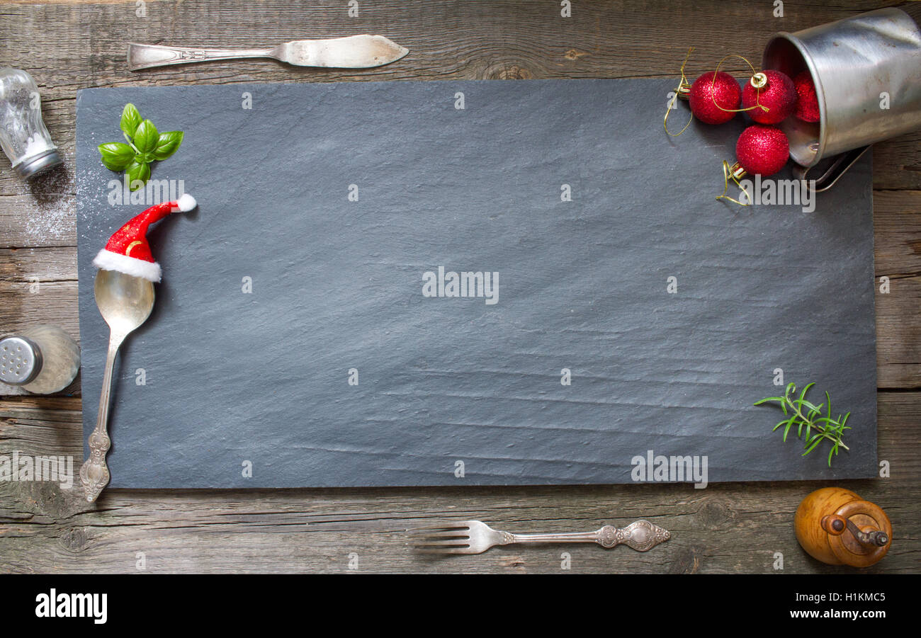 Abstract di Natale sfondo culinario sul vecchio retrò pietra nera Foto Stock