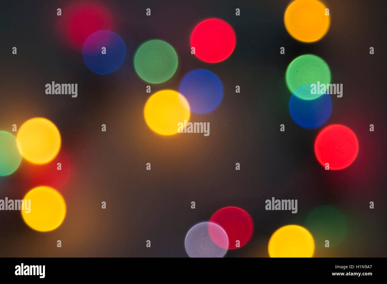 Abstract sfocate luci vacanze in diversi colori. Foto Stock