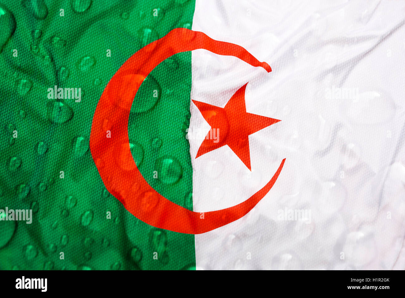 Flag di tessili di Algeria con gocce di pioggia Foto Stock