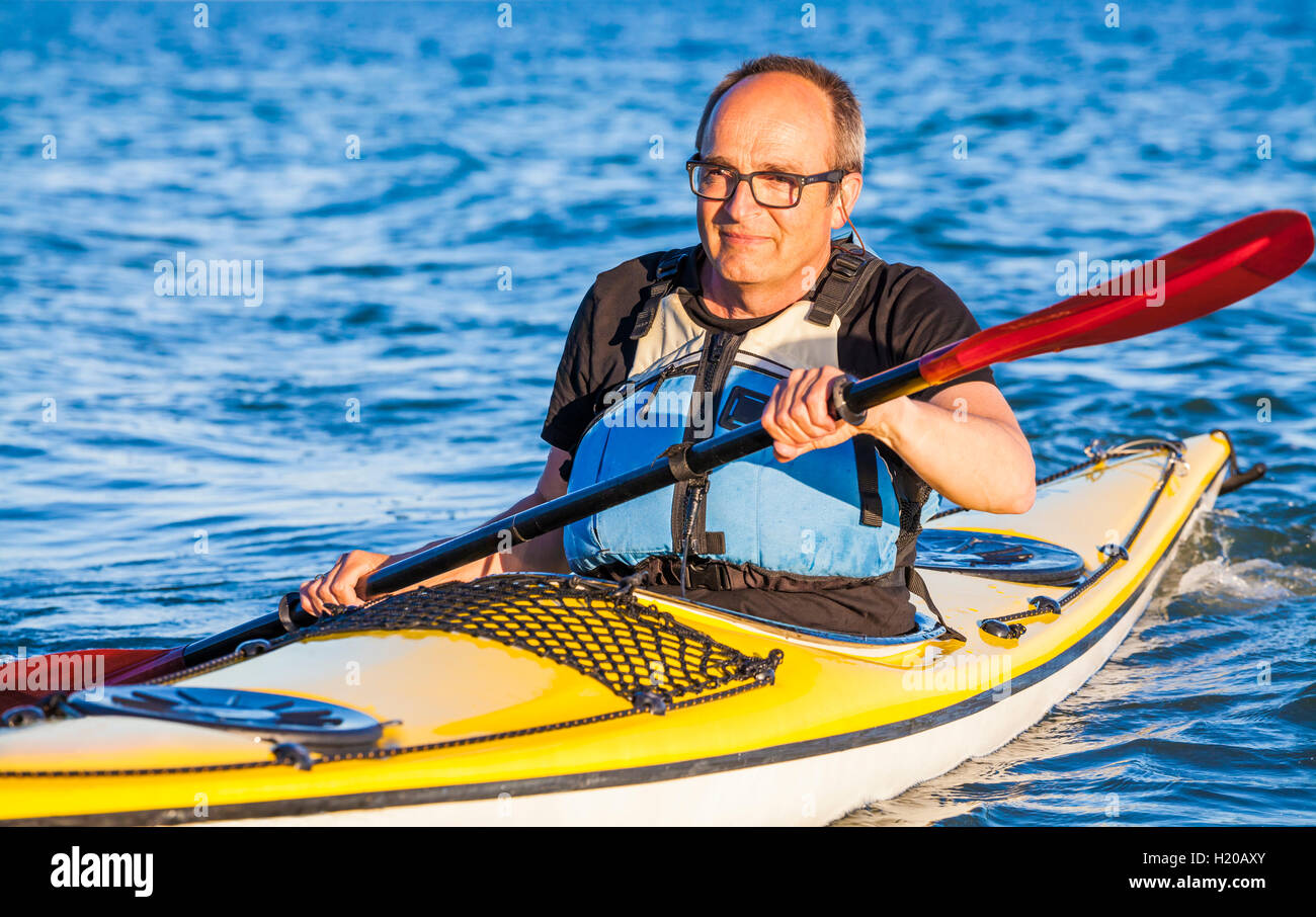 Danimarca, senior uomo canoa, kayak Foto Stock