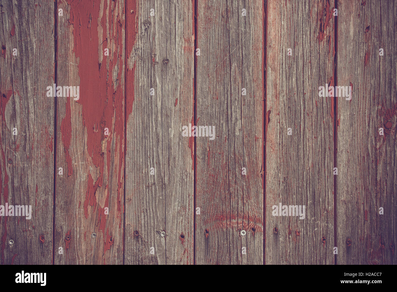 Tavole di legno con sfondo rosso vernice grunge Foto Stock