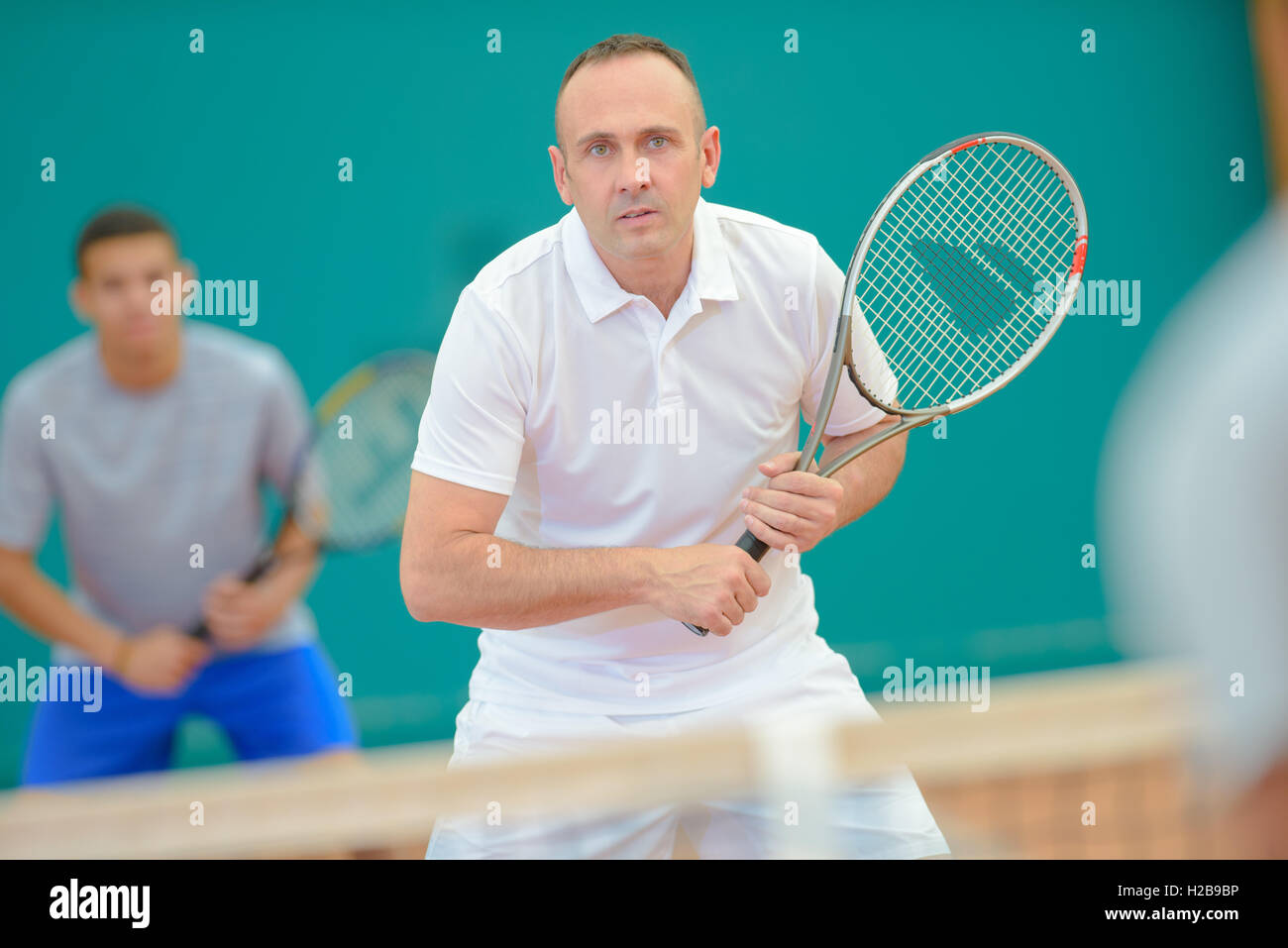 Gioco di tennis doubles match Foto Stock