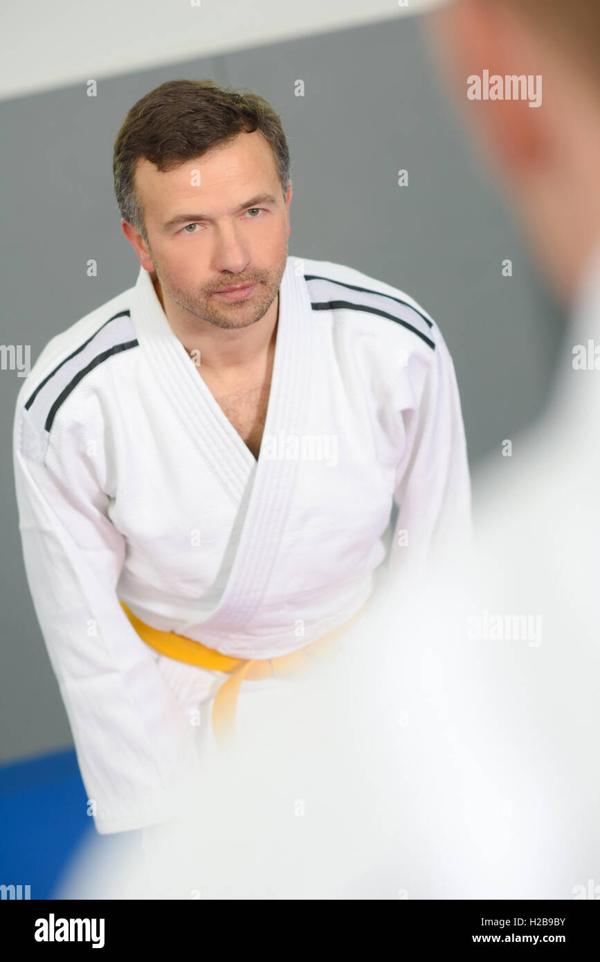 Piegando in un dojo Foto Stock