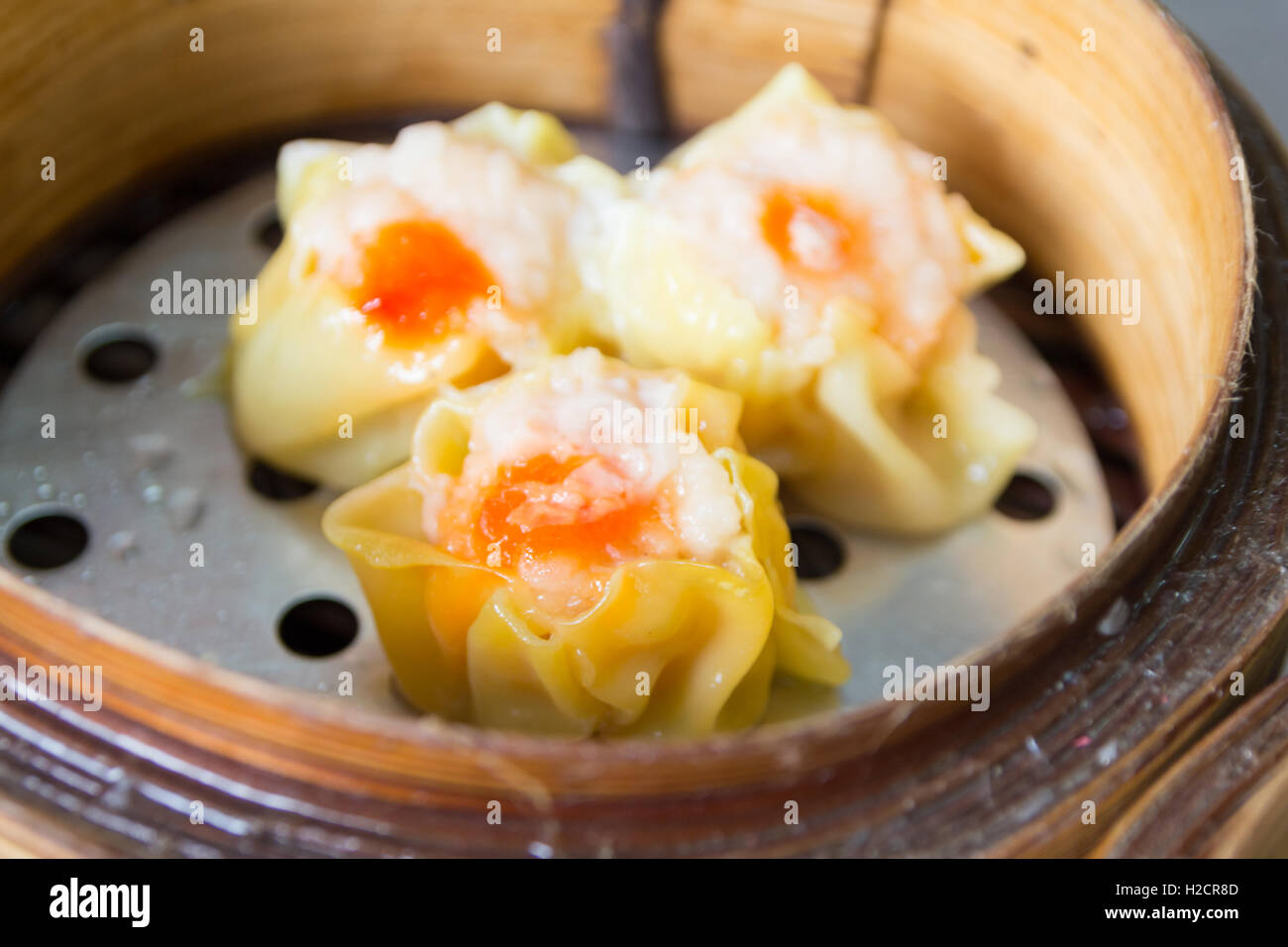 Cinese Dim Sum in bambù sistema di cottura a vapore Foto Stock