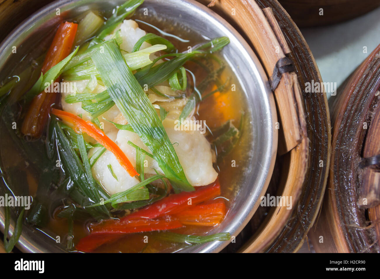 Cinese Dim Sum in bambù sistema di cottura a vapore Foto Stock