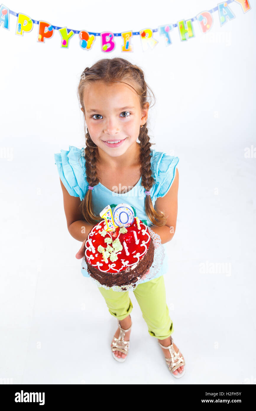 Ragazza con torta di compleanno Foto Stock