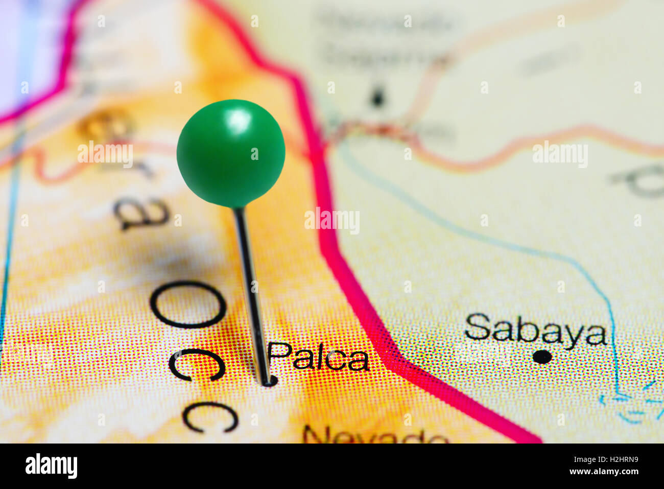 Palca imperniata su una mappa del Cile Foto Stock