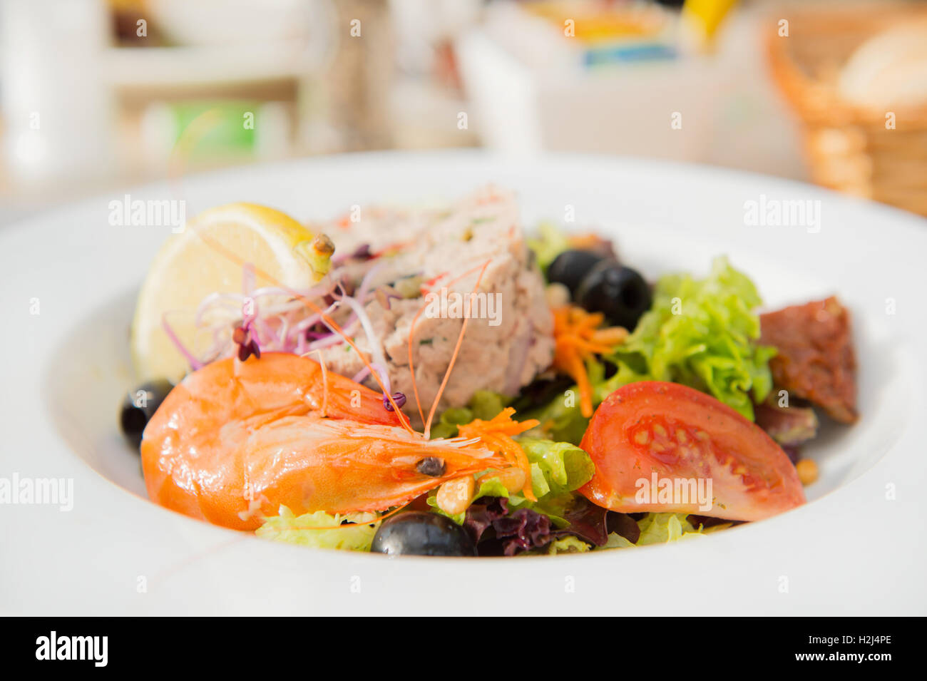Scampi e patè di pesce sulla piastra Foto Stock