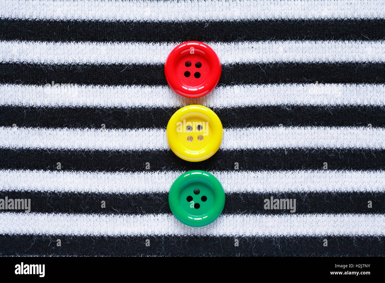Pulsanti sul giubbotto con striping Foto Stock