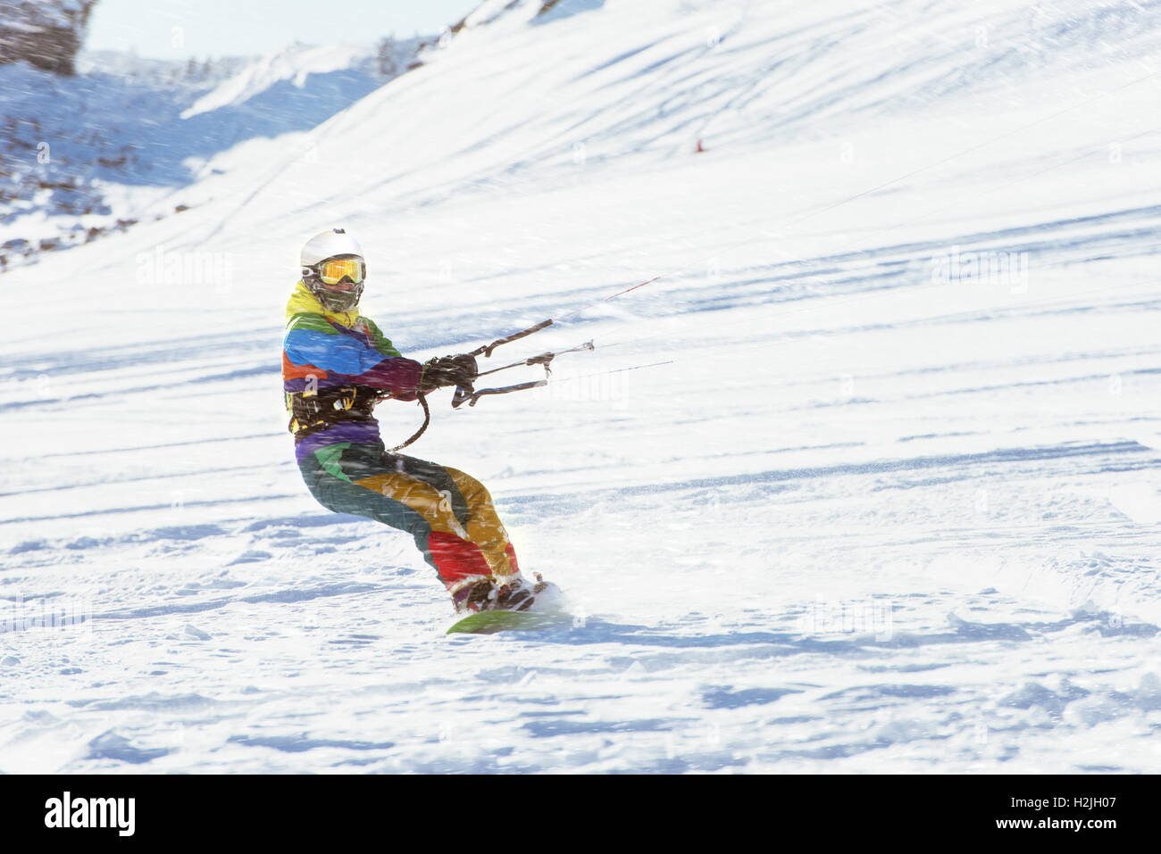 Snowboarder girl kite sport snowboard Foto Stock