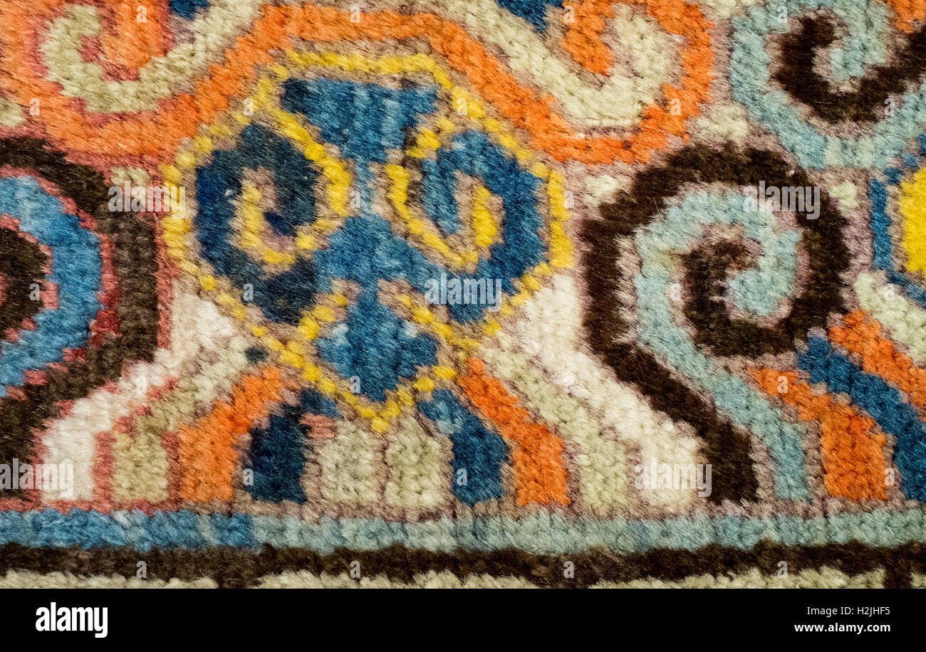 Primo piano di una tappeti fatti a mano sul dettaglio di disegno Foto Stock