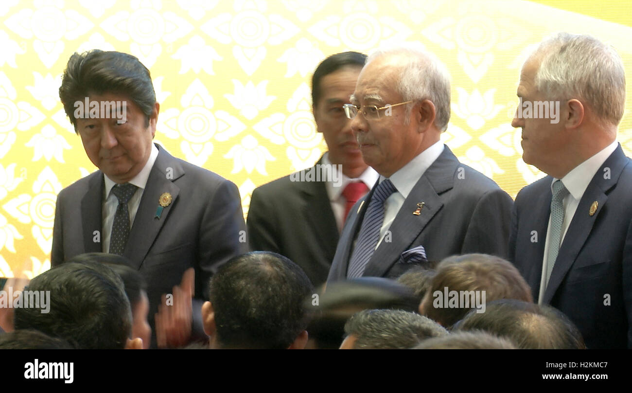 Leader di stand per le foto durante l'Associazione delle nazioni del sud-est asiatico (ASEAN) summit il Laos capitale Vientiane. Foto Stock