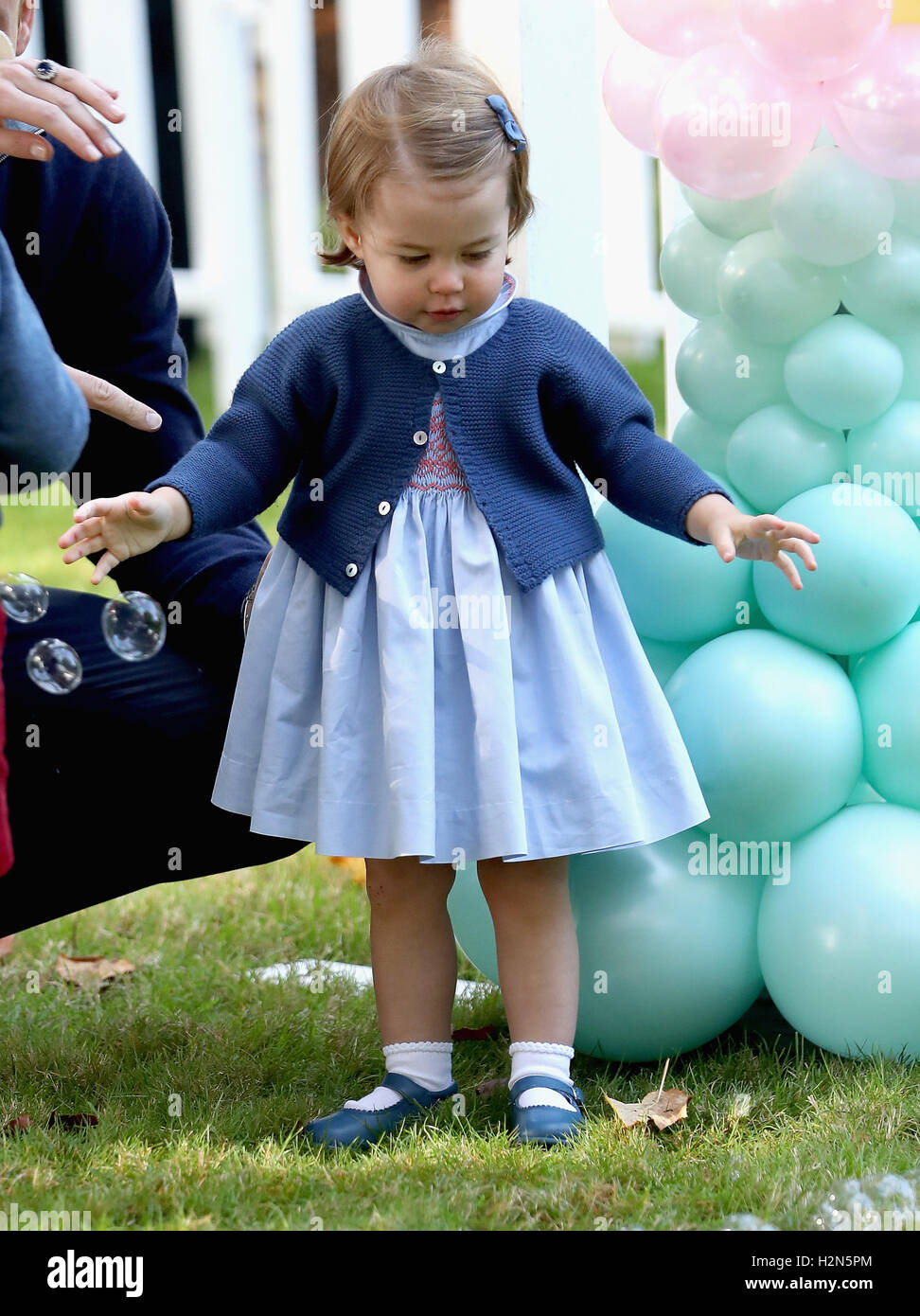 Princess Charlotte a una festa di bambini per famiglie militari al Palazzo del Governo di Victoria durante il Royal Tour del Canada. Foto Stock