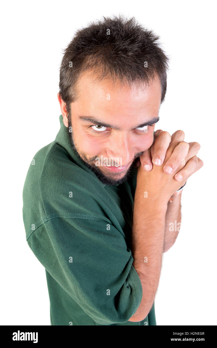 Giovane uomo che fa le facce isolato in bianco Foto Stock