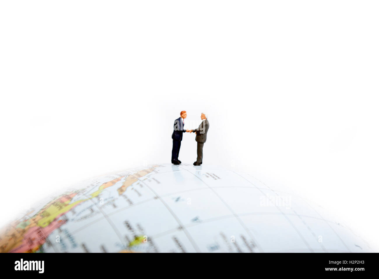 Business man in piedi sulla terra Foto Stock