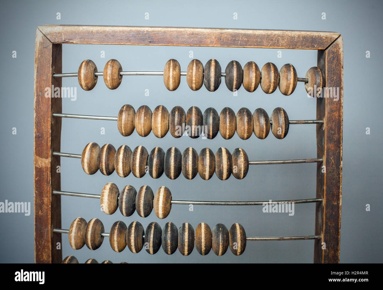 Abacus contabili sul grigio Sfondo testurizzata Foto Stock