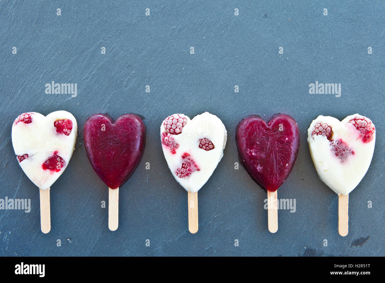 Ghiaccioli nel cuore-forma Foto Stock