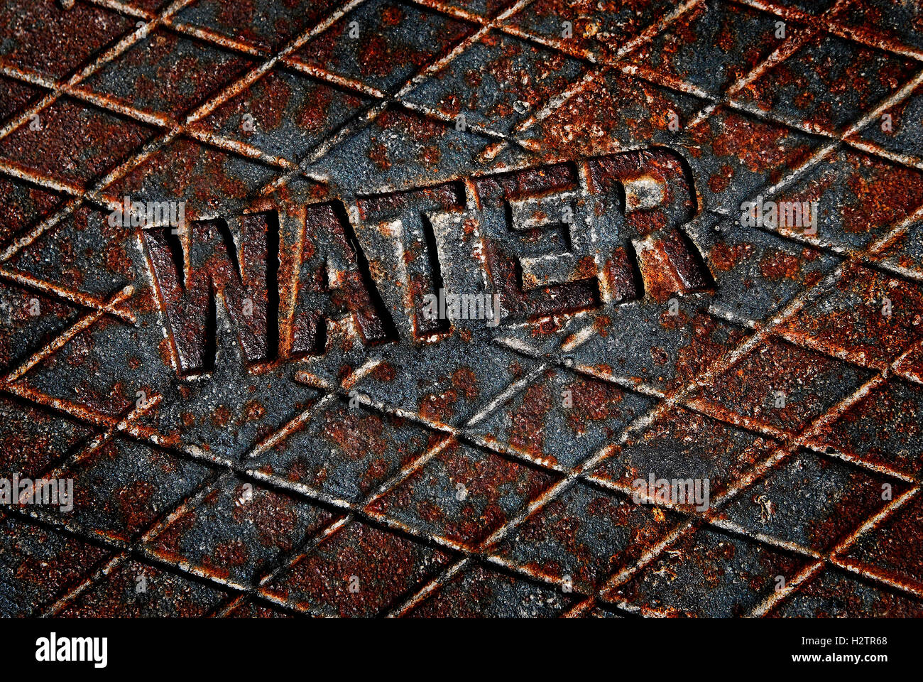 Acqua coperchio tombino utilità Servizio di tubi Foto Stock