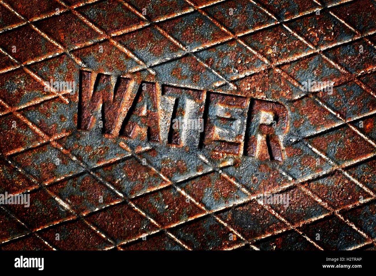 Acqua coperchio tombino utilità Servizio di tubi Foto Stock