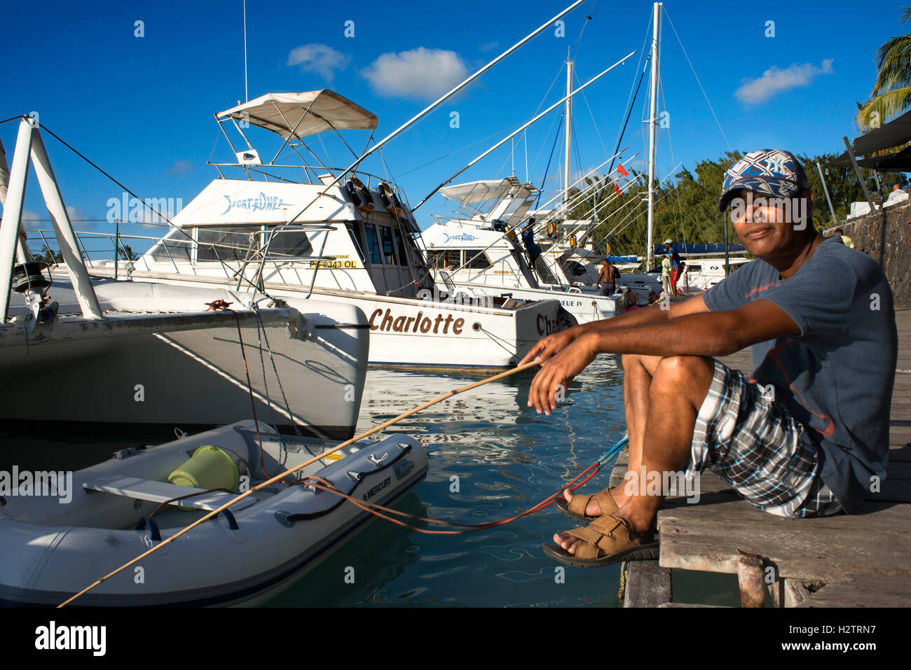 I pescatori in Grand Baie, Riviere Du Rempart, Mauritius, Oceano indiano, Africa Foto Stock