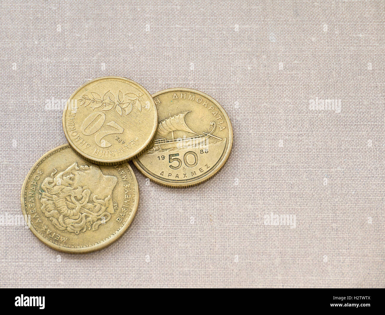 La dracma greca monete sulla tela lo sfondo Foto Stock