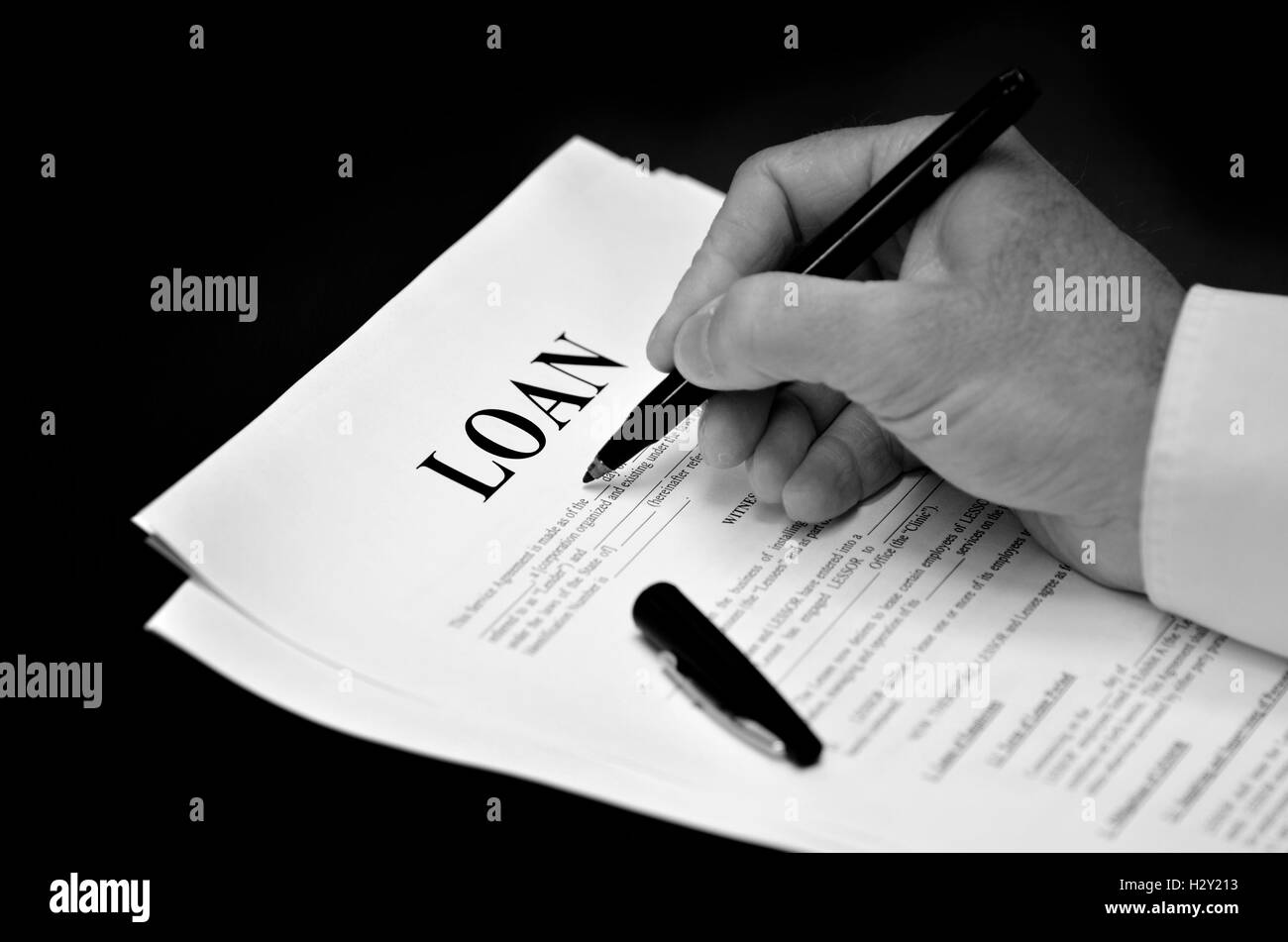 Documento di prestito e di accordo con la penna per la firma Foto Stock