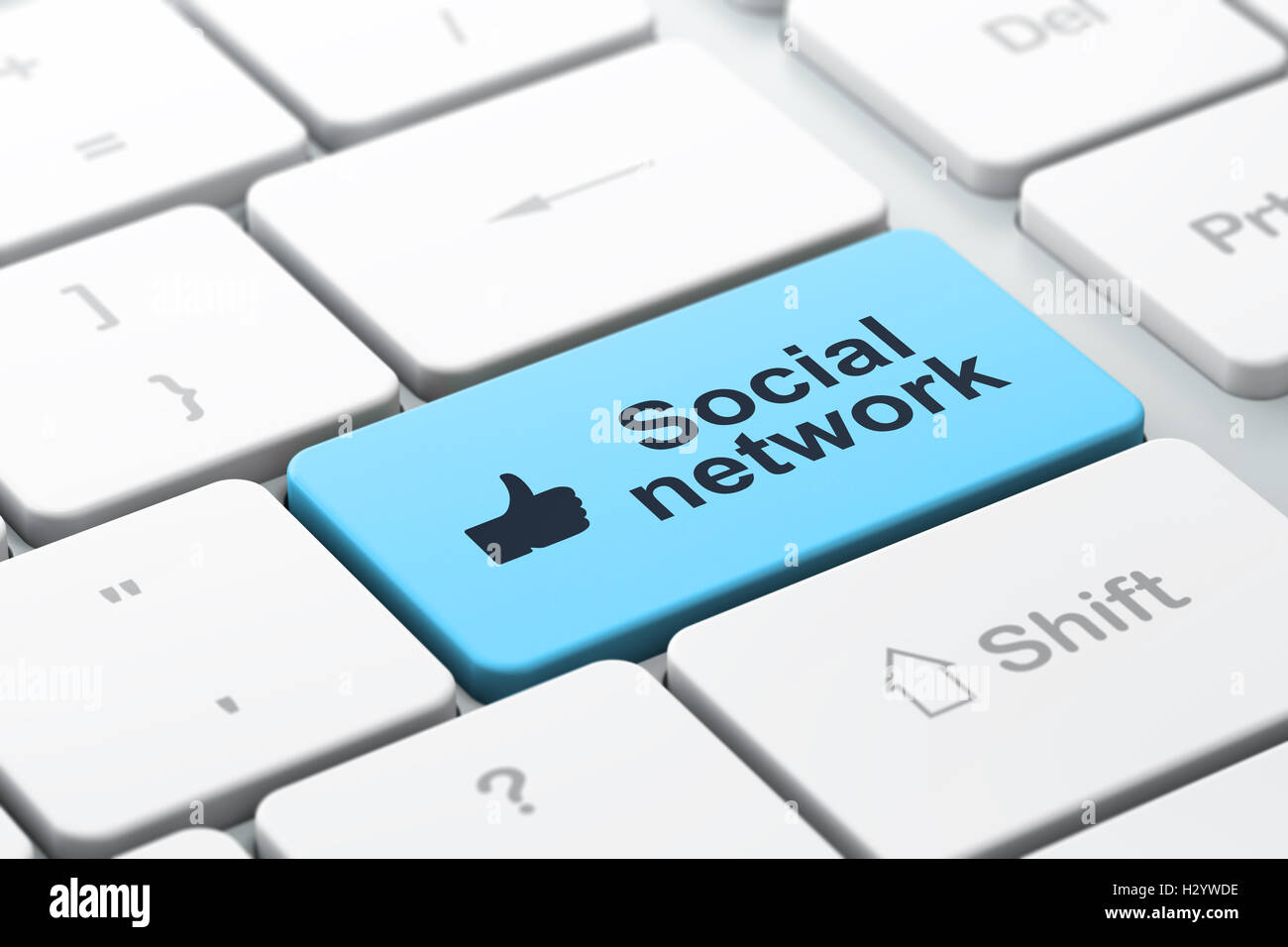 Social media concetto: pollice in alto e social network sul computer sullo sfondo della tastiera Foto Stock