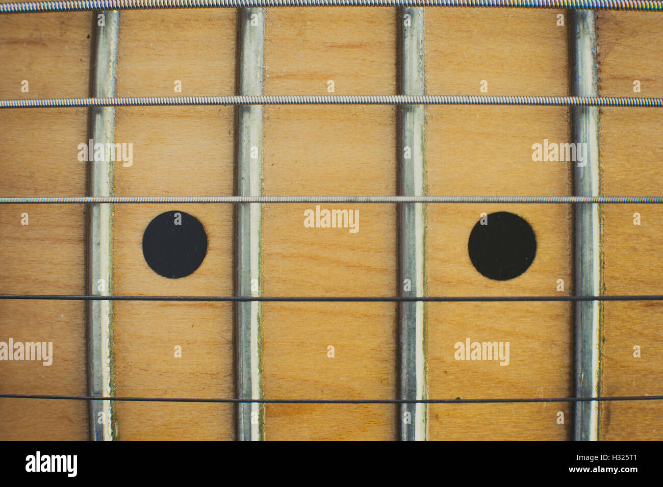 Chitarra elettrica al collo e un paio di punti di marcatura dettaglio vista dall'alto Foto Stock