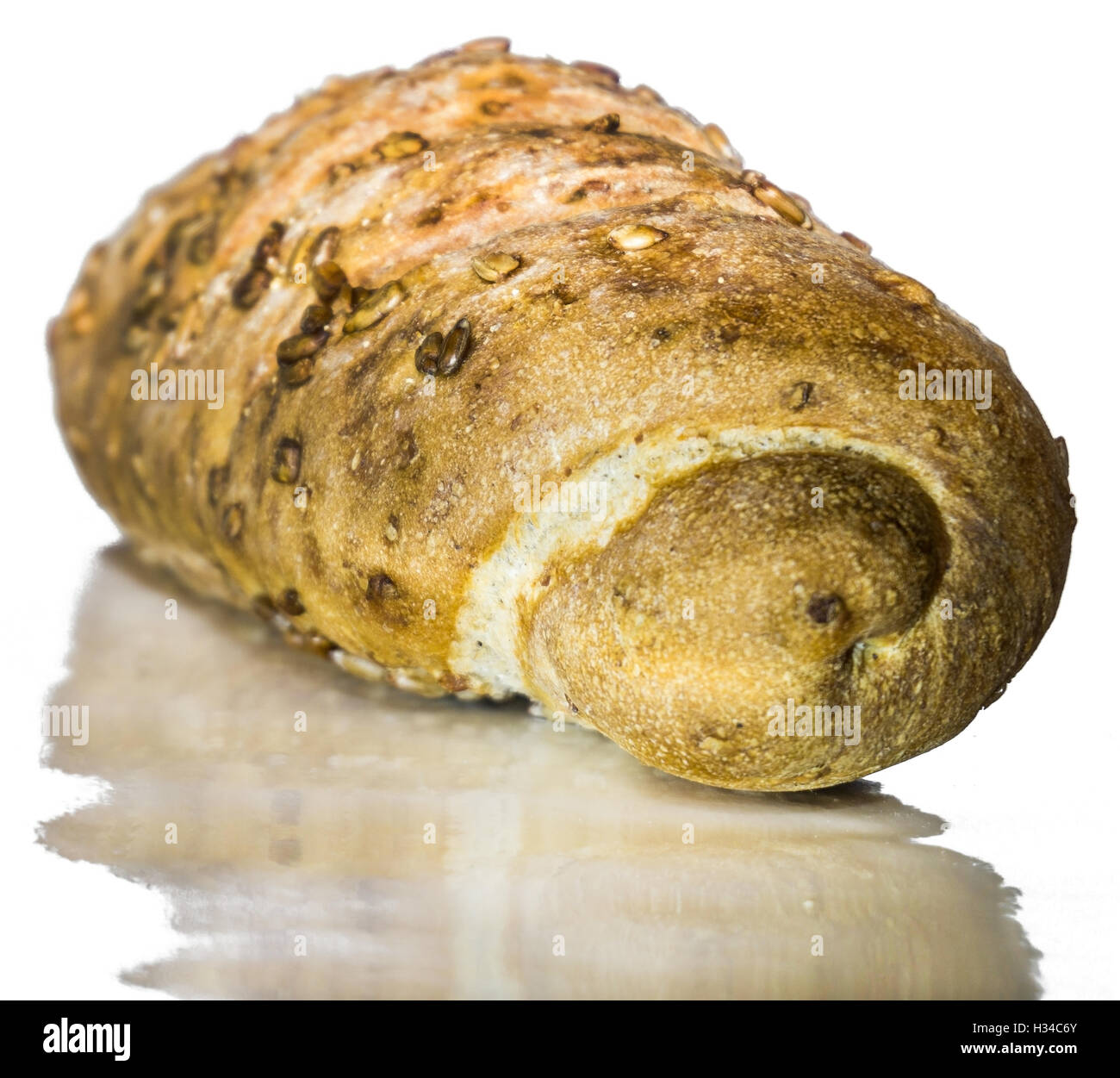 Pane con semi su sfondo bianco Foto Stock