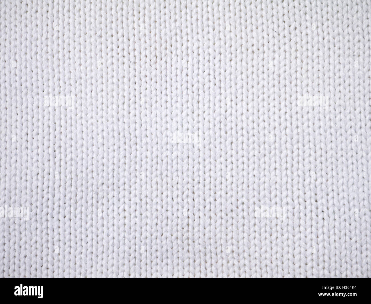 Cotone bianco tessuto a maglia sullo sfondo Foto Stock