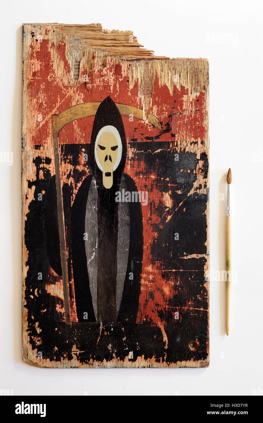 Free art dipinto su un pezzo di legno compensato di Grim Reaper Foto Stock