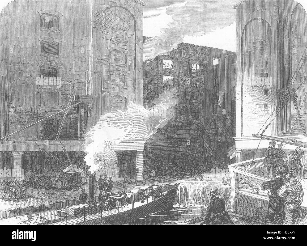 LONDON fire a St Katherine Docks 1866. Illustrated London News Foto Stock