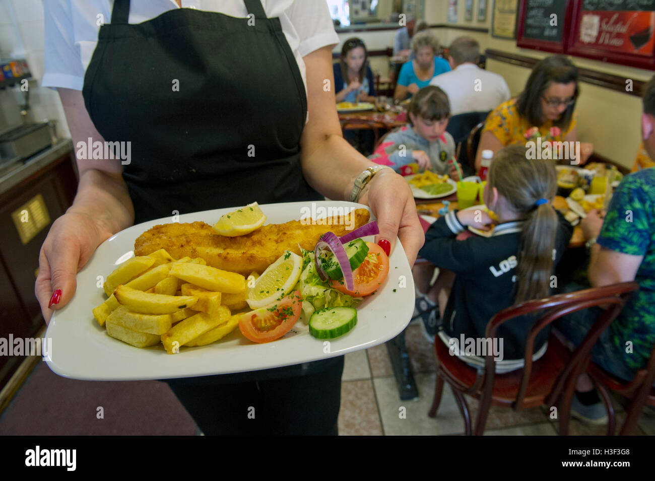 Papa's il tradizionale pesce e patatine ristorante, Weston-Super-Mare, Somerset. Foto Stock