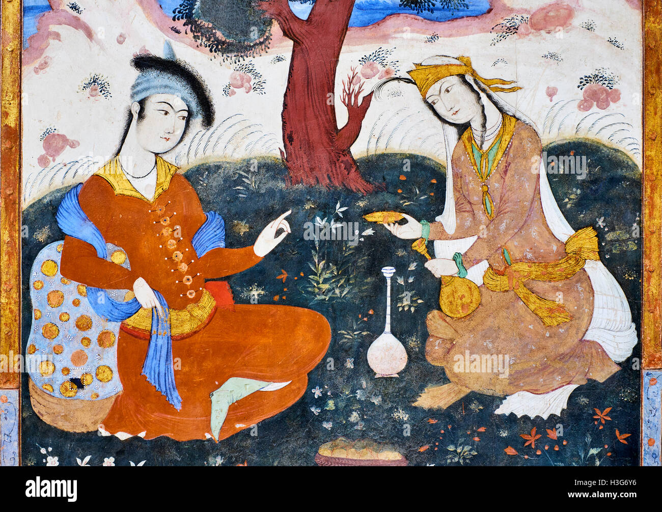 Iran, Isfahan, Chehel Sotun palace, la grande sala o trono hall pittura, persiano uomo pourring vino Foto Stock