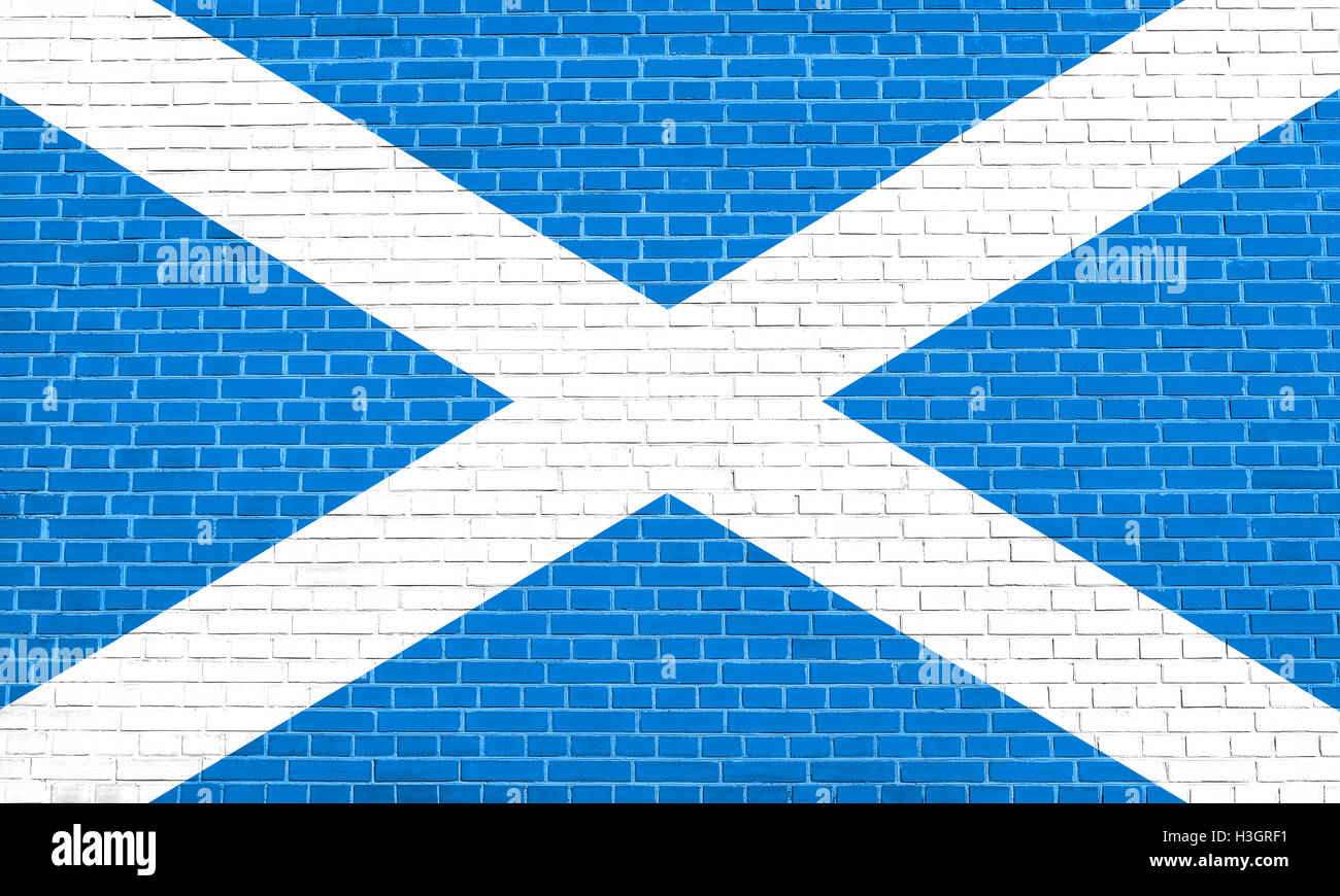 Scottish National bandiera ufficiale. Simbolo patriottico, banner, elemento dello sfondo. Bandiera della Scozia sul muro di mattoni texture Foto Stock