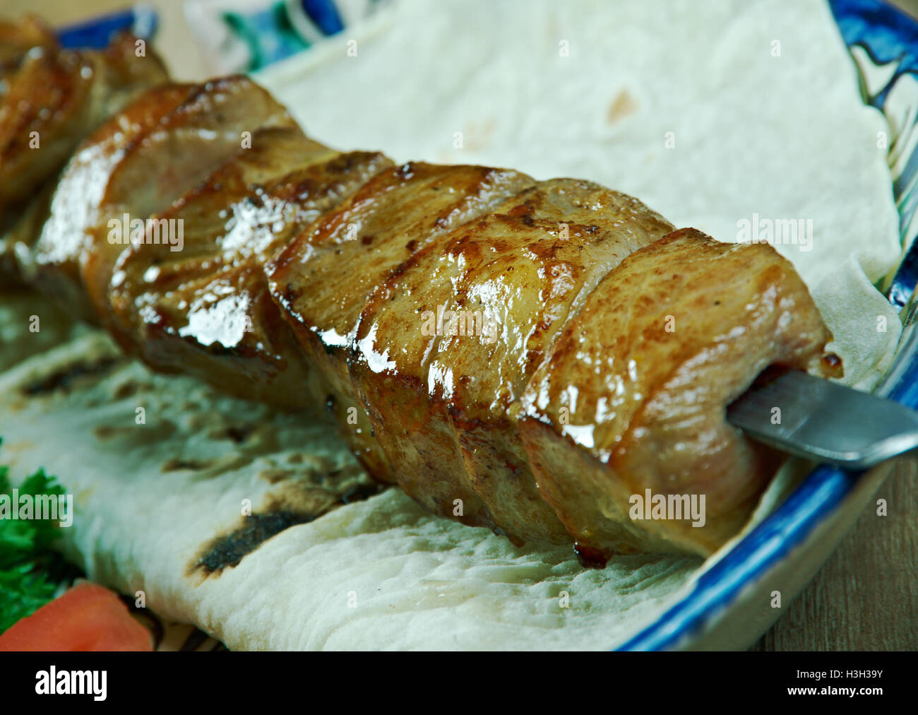 Lo shashlik (shish kebab). Carni bovine rendendo torrefatto Foto Stock