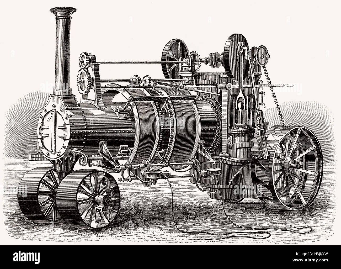 Macchina a vapore i sistemi dell'aratro al lavoro, trattore agricolo alimentato da un motore a vapore del XIX secolo Foto Stock