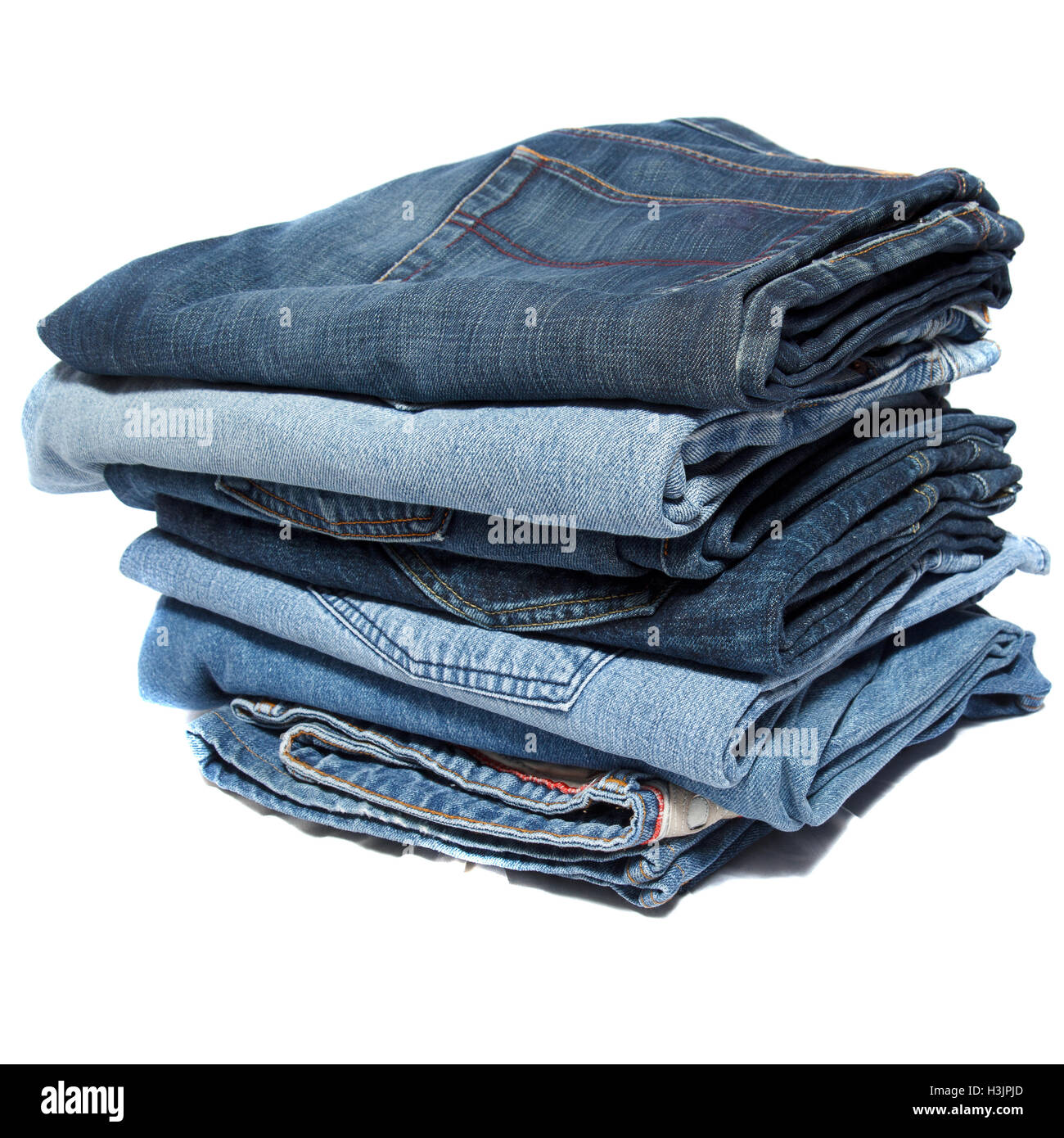 Accatastati ripiegati jeans Foto Stock