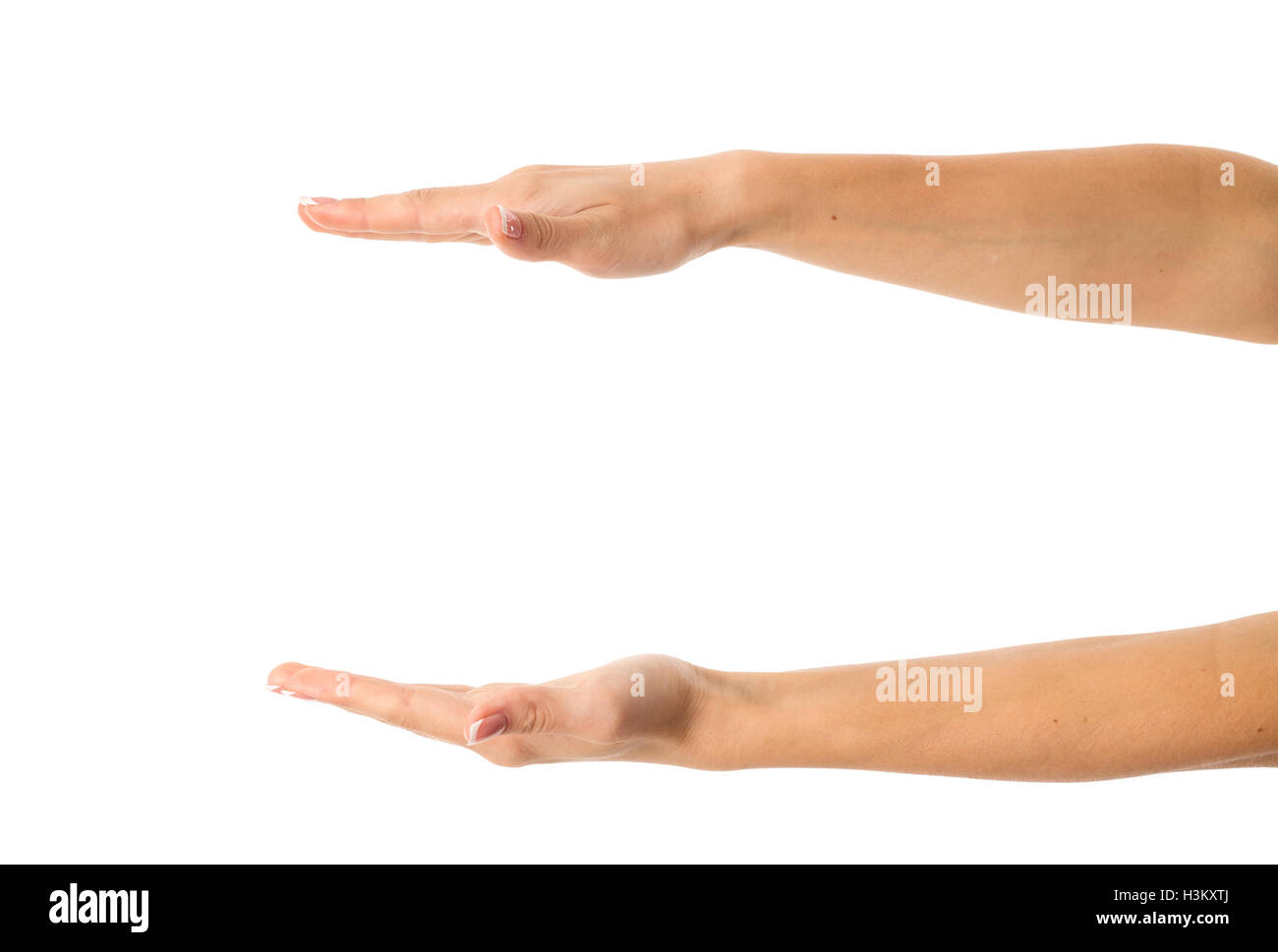 Donna con le mani in mano davanti all altra Foto Stock
