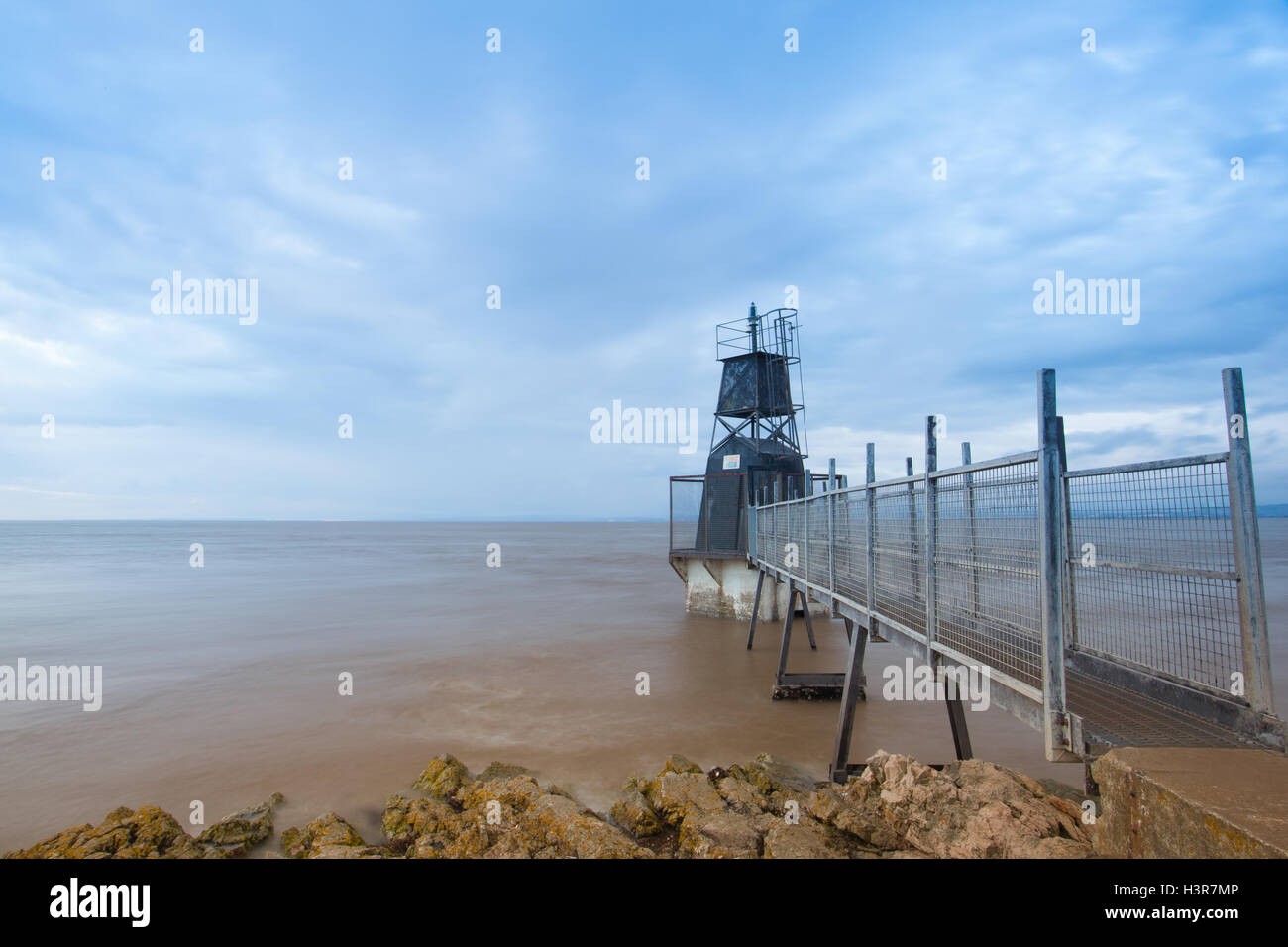 Battery Point Lighthouse, Portishead, Gran Bretagna. Vintage faro al tramonto. Foto Stock