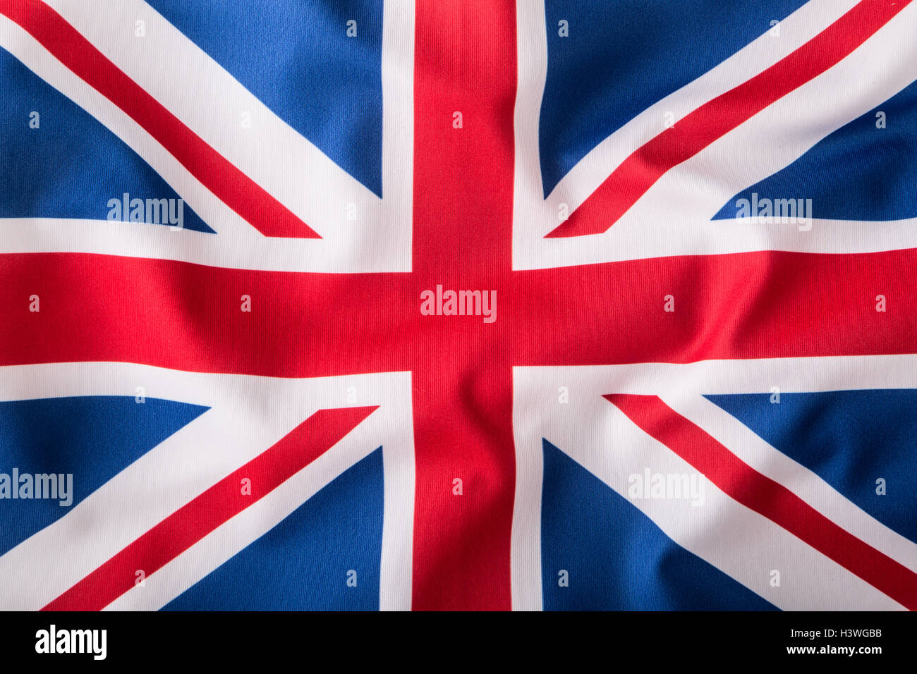 Primo piano della Union Jack flag. Bandiera del Regno Unito. Britannica Union Jack flag al vento. Foto Stock