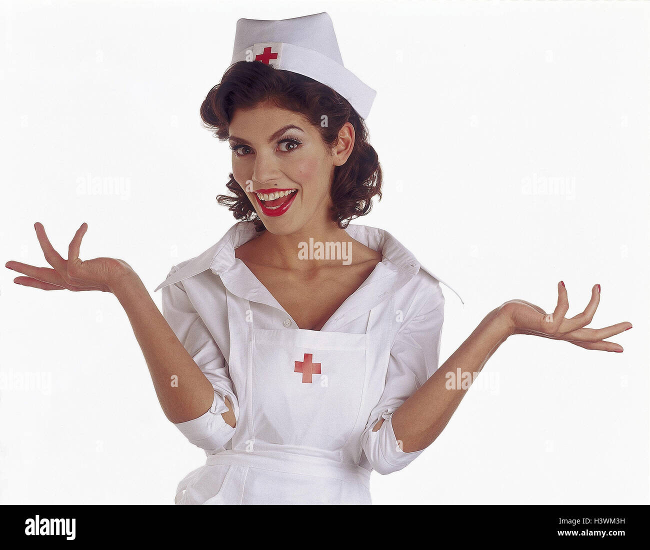 L'infermiera, il gesto, metà ritratto, donne, personale infermieristico, professione, personale ospedaliero, la medicina, l'innocenza, la Calmness, ridere, innocentemente, Foto Stock